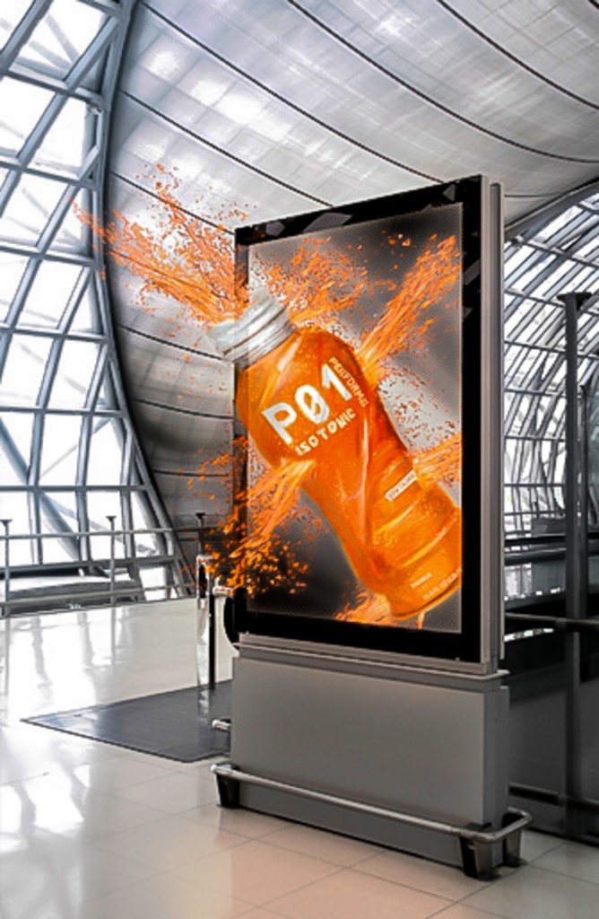3D panel with an orange bottle leaning out of it.